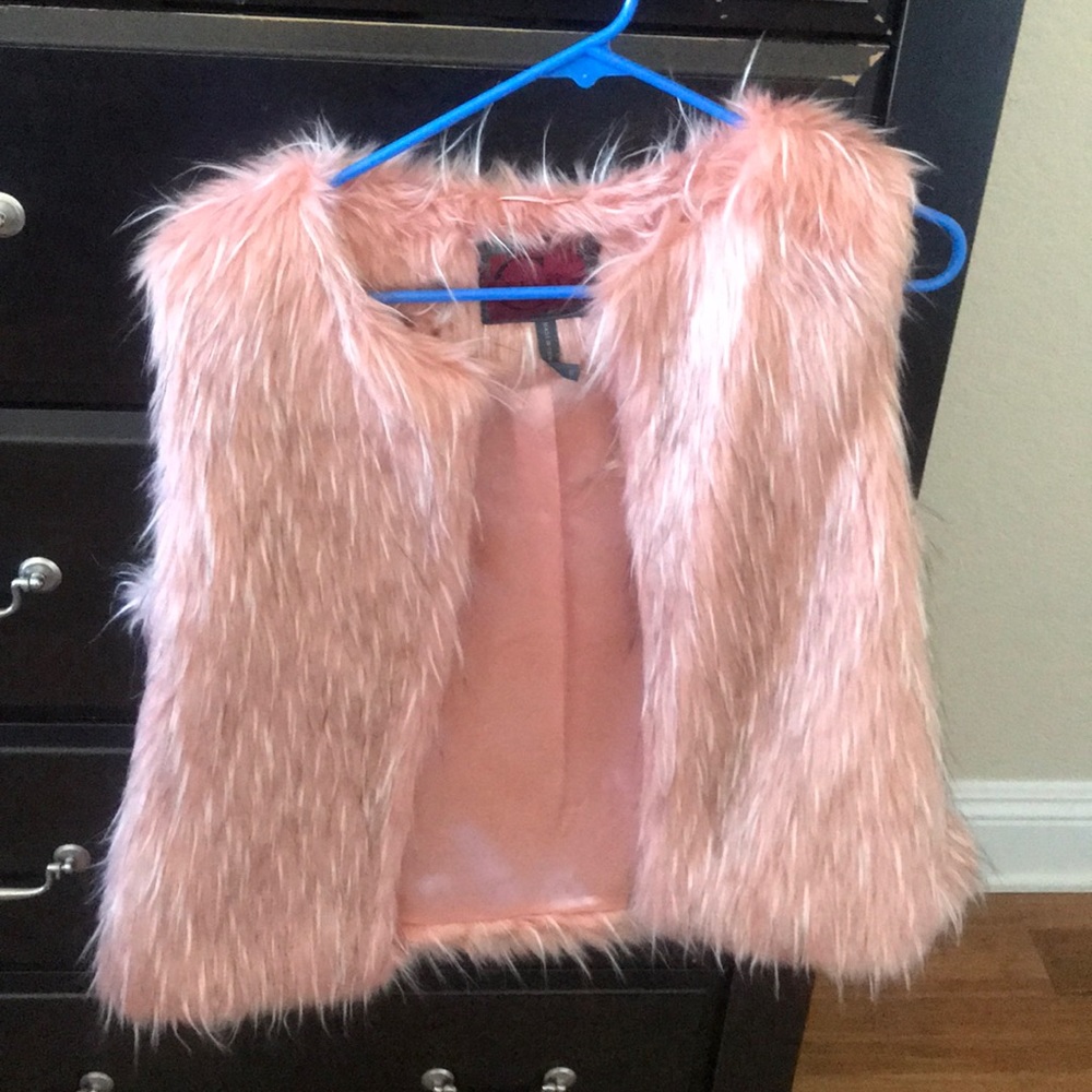 Never worn pink feathered vest